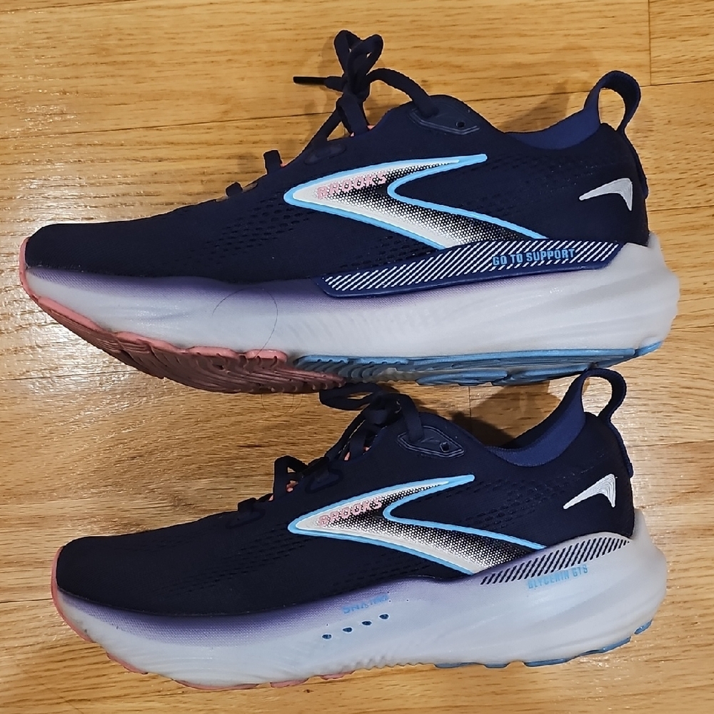 Brooks Dark Blue Athletic Shoes with White and Pink Highlights